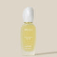 Havéa bond & repair hair oil bottle on a beige background