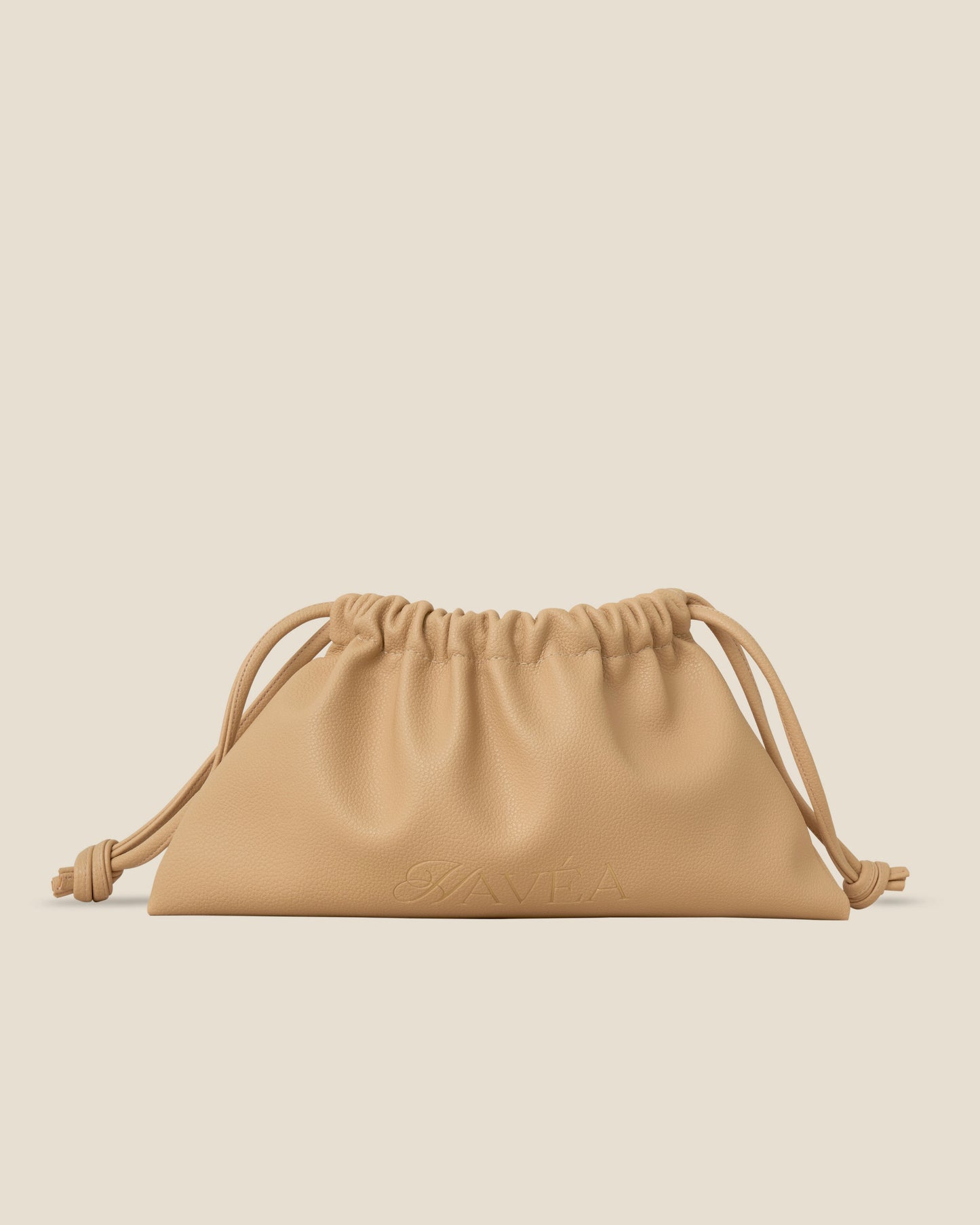 Beige drawstring pouch with 'Havéa' branding on a beige background